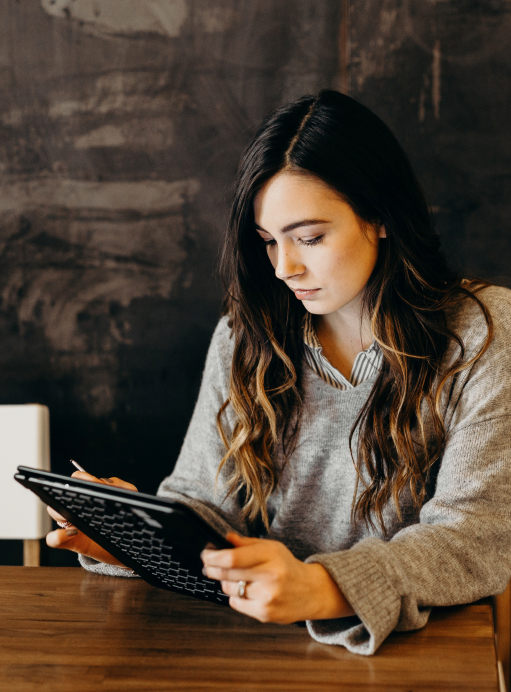 Broker studying iPad