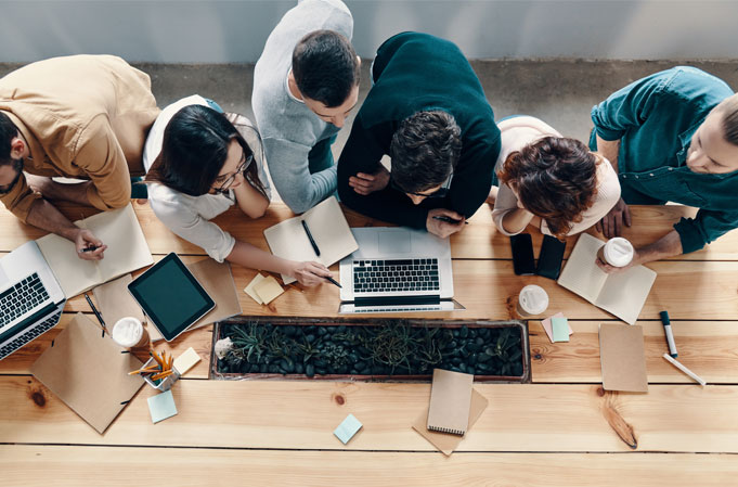 Group of people reviewing PEO consulting services