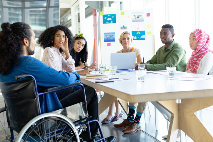 Business people discussing with each other in meeting at conference room in a modern office Defining Diversity, Equity, and Inclusion