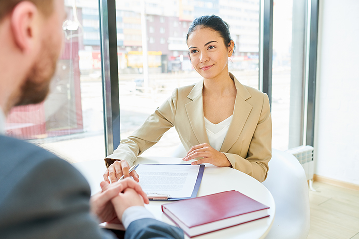 Three Considerations for Employee Performance_BLOG_IMAGE An employer conducting an employee performance review