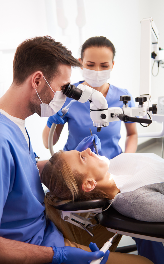 dental-programs Dentists operating on dental patients