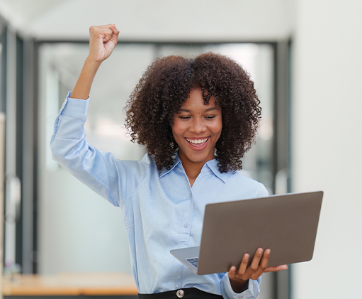Cheering employee reading a file