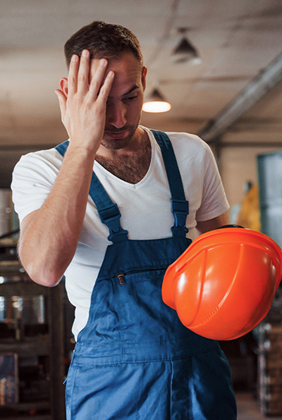 Stressed construction worker