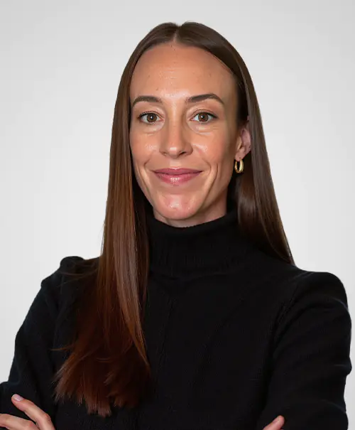 Shot of a beautiful young woman posing against a white backgroun Heather Smith - Vice President of Risk Management